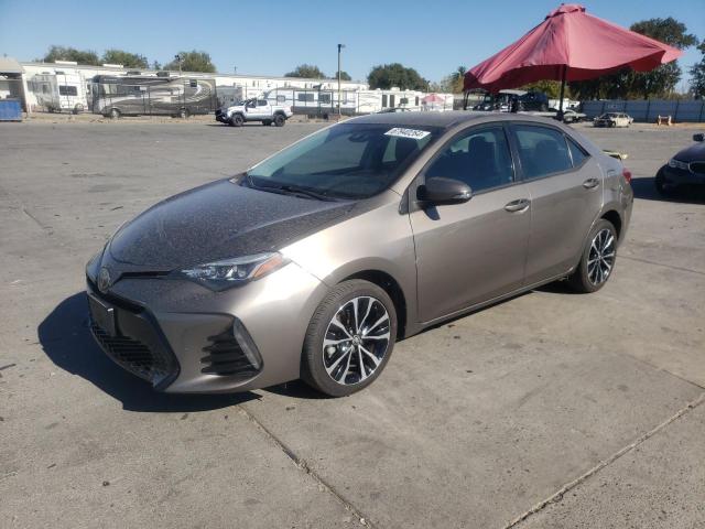 TOYOTA COROLLA L 2017 with VIN 5YFBURHE6HP631287 - Photo from auction