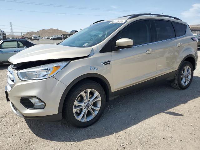 FORD ESCAPE SE 2018 with VIN 1FMCU0GDXJUA24306 - Photo from auction