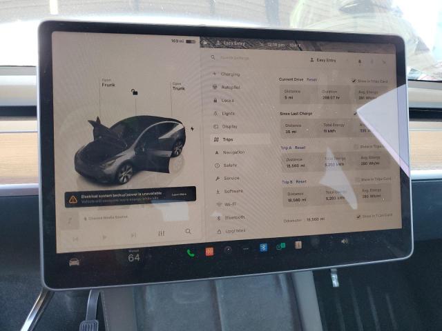 Photo 9 from auction – 2023 TESLA MODEL Y with VIN 7SAYGAEE4PF832044