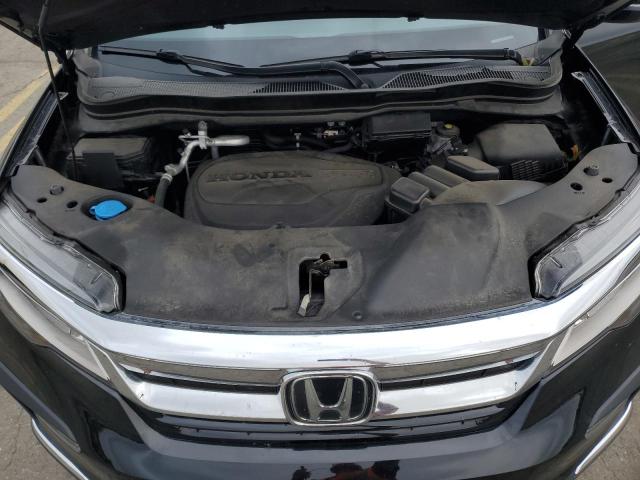 Photo 12 from auction – 2021 HONDA PILOT TOUR with VIN 5FNYF6H94MB068008