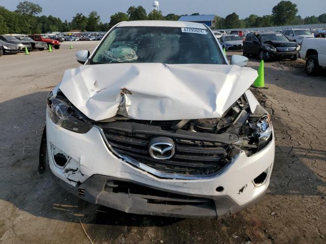 Photo 5 from auction – 2016 MAZDA CX-5 with VIN JM3KE2BY9G0891979