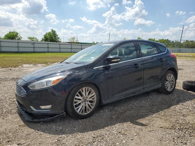 FORD FOCUS TITA 2017 with VIN 1FADP3N29HL320586 - Photo from auction