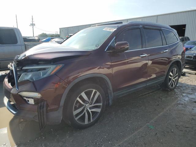 HONDA PILOT TOUR 2016 with VIN 5FNYF6H93GB126582 - Photo from auction