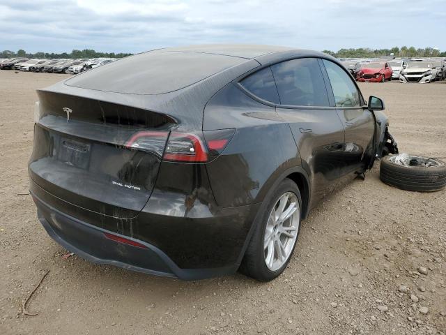 Photo 3 from auction – 2023 TESLA MODEL Y with VIN 7SAYGDEE3PF666231
