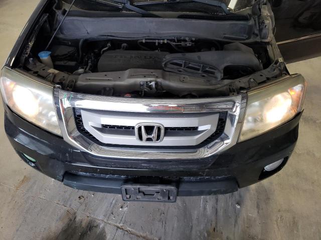 Photo 12 from auction – 2011 HONDA PILOT TOUR with VIN 5FNYF3H96BB053814