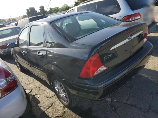Photo 2 from auction – 2000 FORD FOCUS with VIN 1FAFP3835YW407090