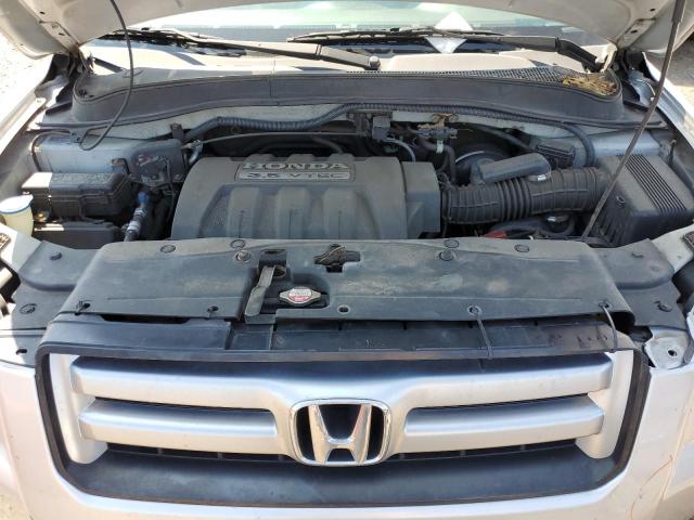 Photo 12 from auction – 2006 HONDA PILOT LX with VIN 2HKYF18146H503501