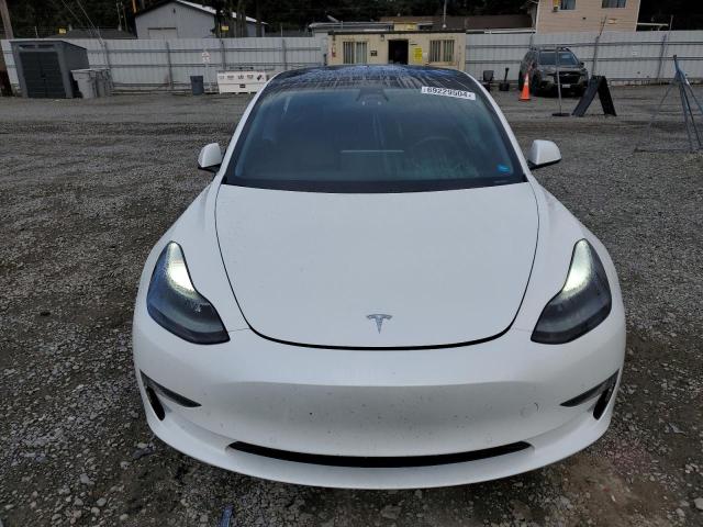 Photo 5 from auction – 2021 TESLA MODEL 3 with VIN 5YJ3E1EB7MF999027