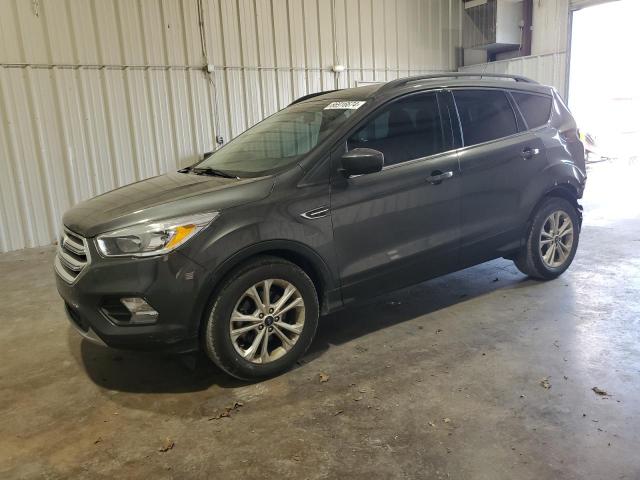FORD ESCAPE SE 2018 with VIN 1FMCU0GDXJUB97758 - Photo from auction