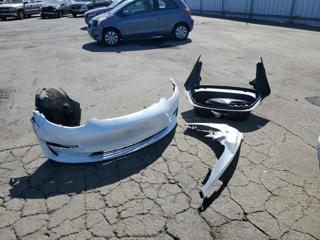 Photo 12 from auction – 2022 TESLA MODEL 3 with VIN 5YJ3E1EB8NF156195
