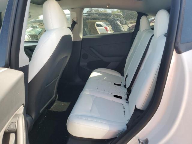 Photo 10 from auction – 2023 TESLA MODEL Y with VIN 7SAYGDEE0PF744433