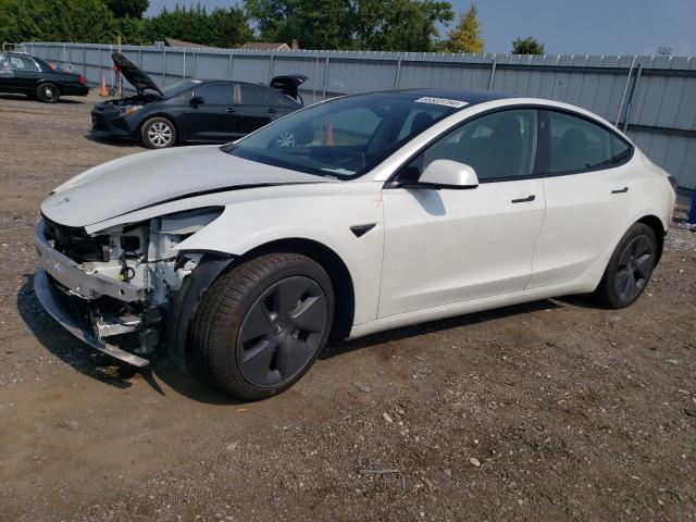 TESLA MODEL 3 2022 with VIN 5YJ3E1EB4NF121489 - Photo from auction