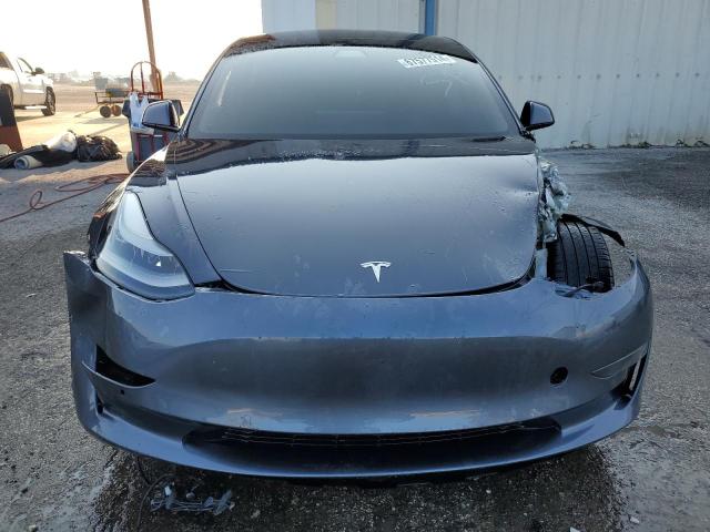 Photo 5 from auction – 2021 TESLA MODEL 3 with VIN 5YJ3E1EA2MF094573