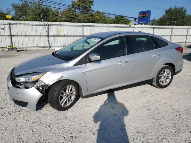 FORD FOCUS SE 2018 with VIN 1FADP3F21JL310235 - Photo from auction