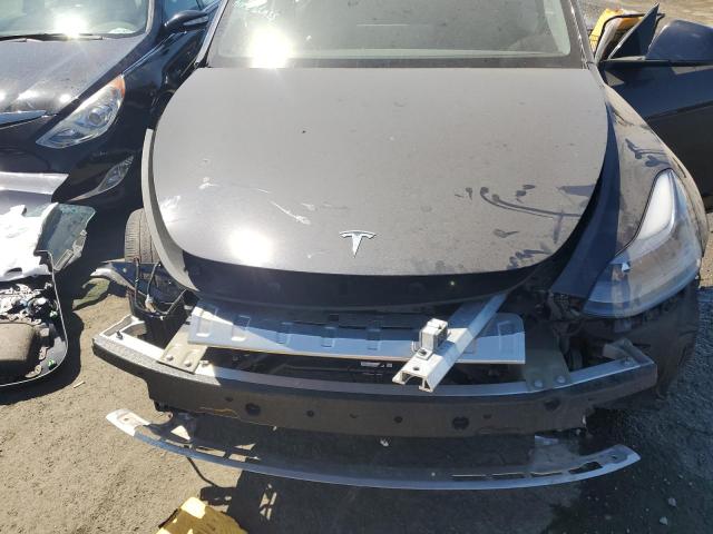 Photo 12 from auction – 2024 TESLA MODEL Y with VIN 7SAYGDEEXRF985015