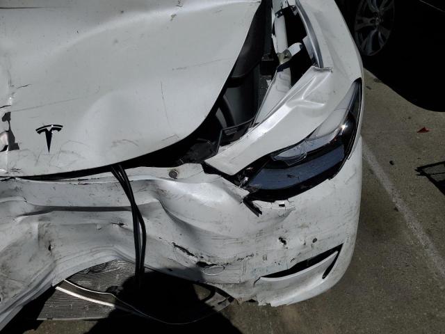 Photo 11 from auction – 2020 TESLA MODEL Y with VIN 5YJYGDEE1LF028406