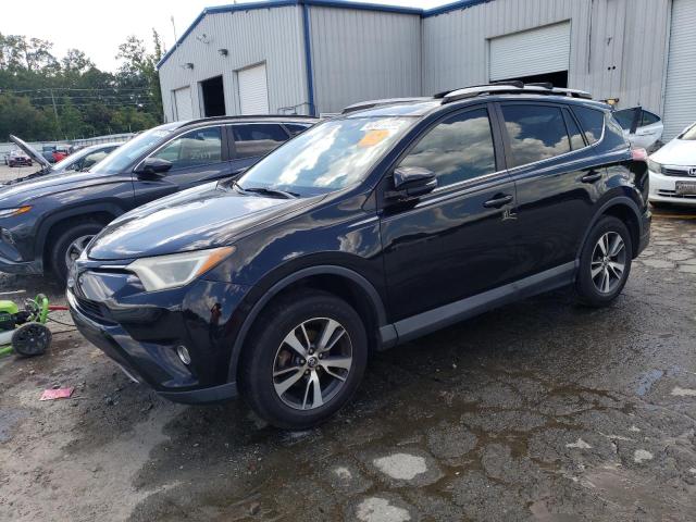 TOYOTA RAV4 XLE 2017 with VIN 2T3WFREV6HW358793 - Photo from auction