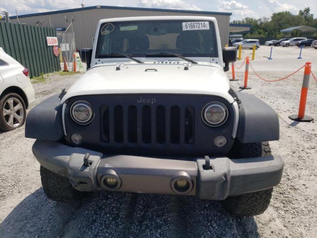 Photo 5 from auction – 2016 JEEP WRANGLER U with VIN 1C4BJWDG4GL105231