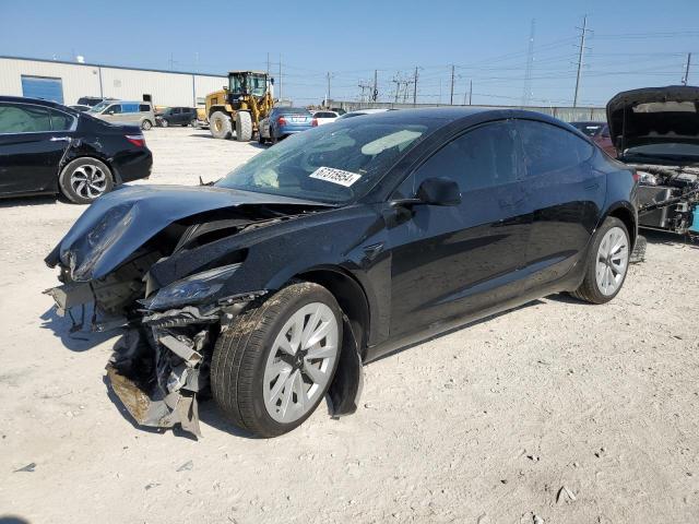 TESLA MODEL 3 2022 with VIN 5YJ3E1EA2NF145099 - Photo from auction