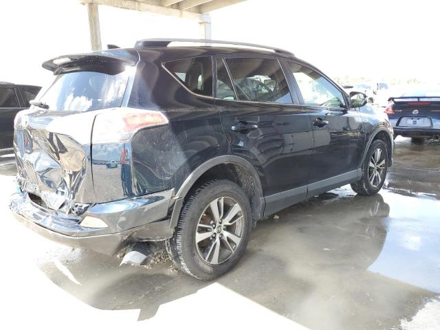 Photo 3 from auction – 2017 TOYOTA RAV4 XLE with VIN JTMWFREVXHD093275