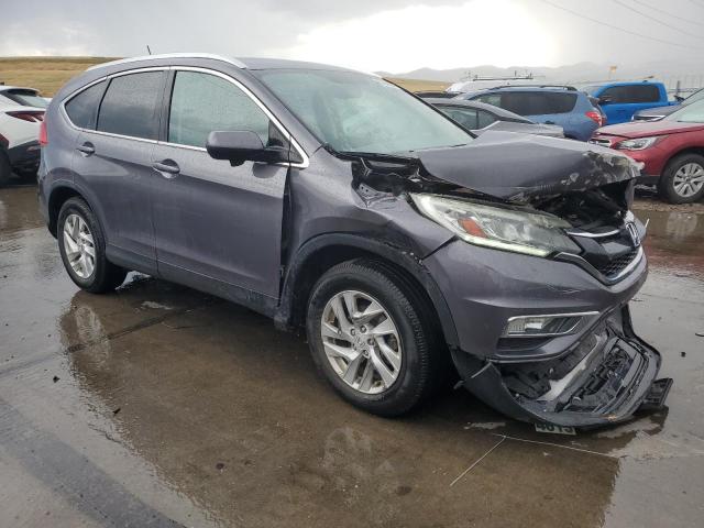 Photo 4 from auction – 2015 HONDA CR-V EXL with VIN 5J6RM4H77FL030313