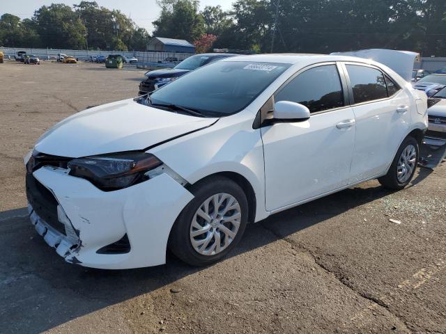 TOYOTA COROLLA L 2017 with VIN 5YFBURHE4HP712143 - Photo from auction