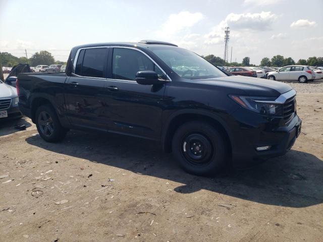 Photo 4 from auction – 2023 HONDA RIDGELINE with VIN 5FPYK3F59PB068608
