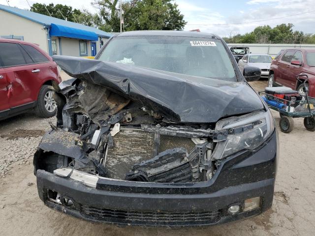 Photo 5 from auction – 2017 HONDA RIDGELINE with VIN 5FPYK3F10HB017626
