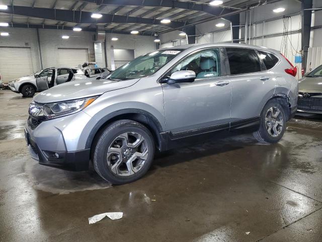 HONDA CR-V EX 2018 with VIN 5J6RW2H52JL009259 - Photo from auction
