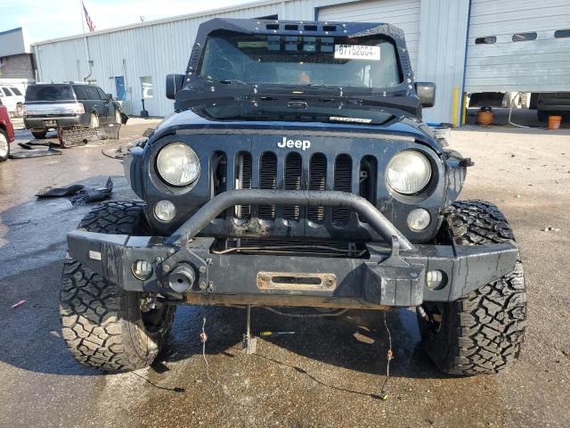 Photo 5 from auction – 2014 JEEP WRANGLER U with VIN 1C4BJWFG7EL199289