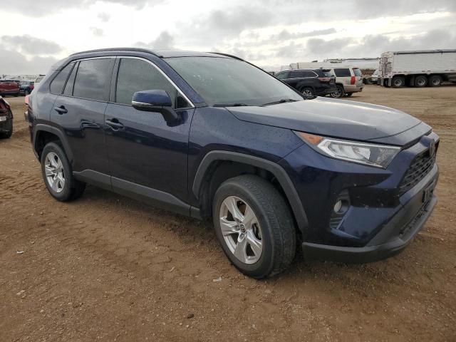 Photo 4 from auction – 2021 TOYOTA RAV4 XLE with VIN JTMP1RFV0MD076965
