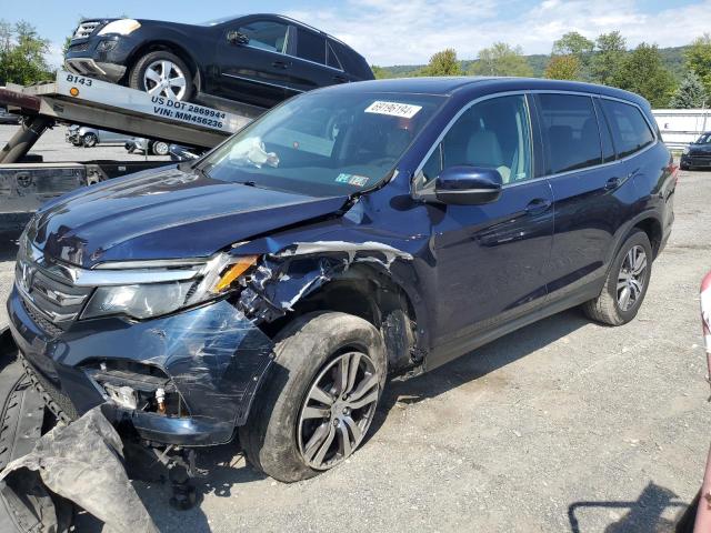 HONDA PILOT EXL 2018 with VIN 5FNYF6H56JB013701 - Photo from auction