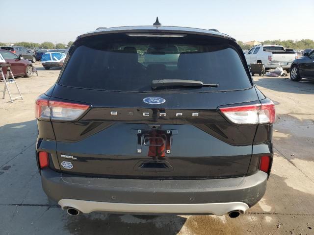 Photo 6 from auction – 2021 FORD ESCAPE SEL with VIN 1FMCU0H69MUA15164