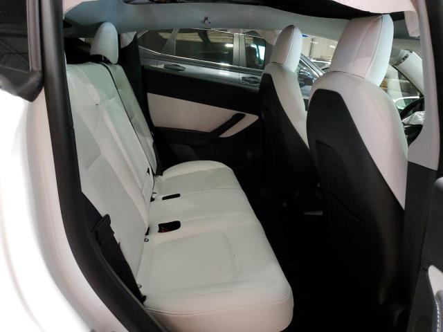 Photo 11 from auction – 2022 TESLA MODEL Y with VIN 7SAYGDEE9NF355190