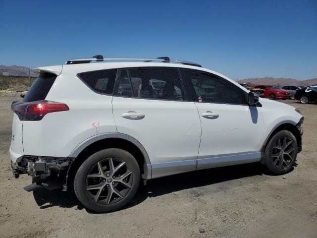 Photo 3 from auction – 2016 TOYOTA RAV4 SE with VIN JTMJFREV4GD185099