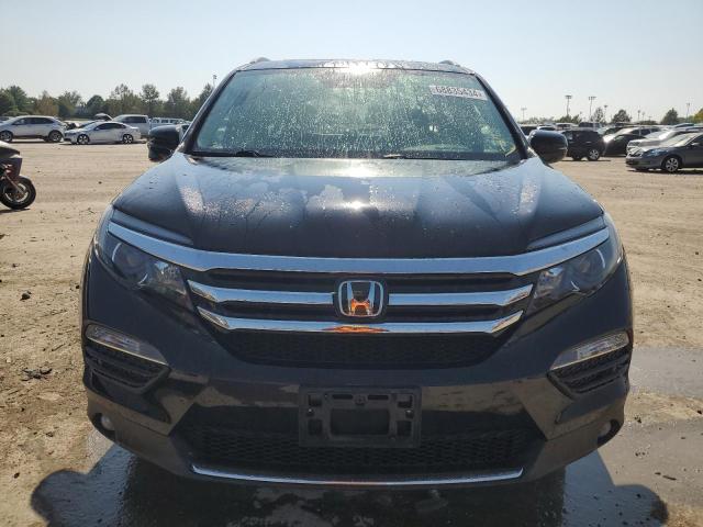 Photo 5 from auction – 2018 HONDA PILOT TOUR with VIN 5FNYF6H94JB009326