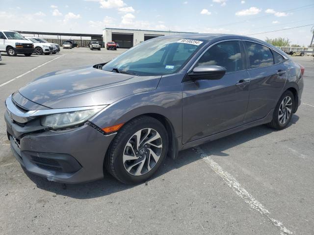HONDA CIVIC EX 2017 with VIN 19XFC2F70HE063247 - Photo from auction
