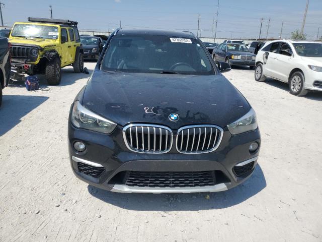 Photo 5 from auction – 2016 BMW X1 XDRIVE2 with VIN WBXHT3C33G5F63600