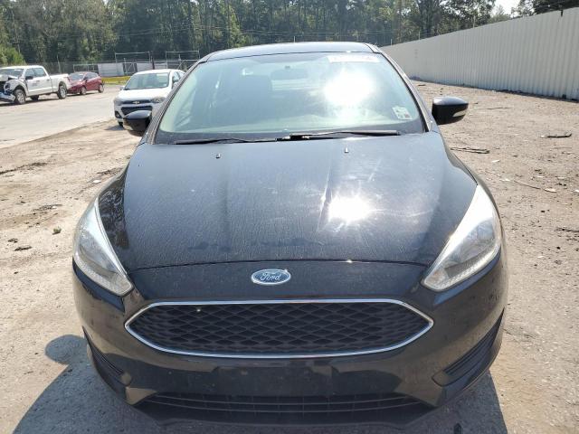 Foto 5 de la subasta – 2017 FORD FOCUS SE con VIN 1FADP3F21HL294242