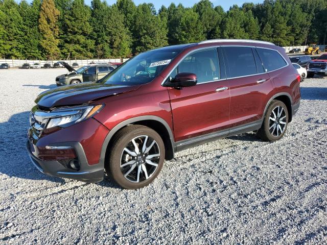HONDA PILOT TOUR 2022 with VIN 5FNYF5H63NB013339 - Photo from auction