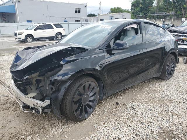 TESLA MODEL Y 2023 with VIN 7SAYGDEF6PF877691 - Photo from auction
