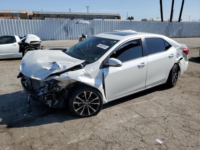 TOYOTA COROLLA L 2017 with VIN 5YFBURHE2HP594593 - Photo from auction