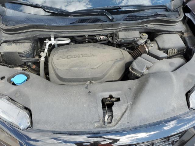 Photo 11 from auction – 2021 HONDA PASSPORT E with VIN 5FNYF8H55MB034491
