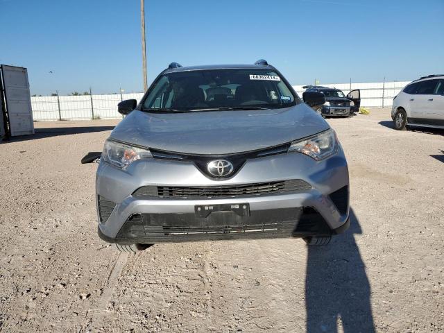 Photo 5 from auction – 2018 TOYOTA RAV4 LE with VIN 2T3ZFREV6JW444141