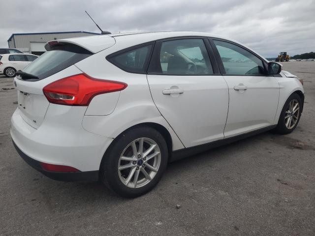 Photo 3 from auction – 2016 FORD FOCUS SE with VIN 1FADP3K28GL294128
