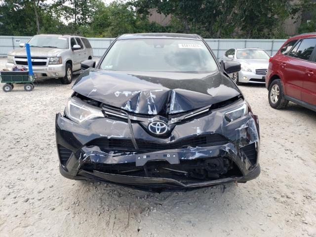 Photo 5 from auction – 2018 TOYOTA RAV4 LE with VIN 2T3BFREV8JW823417