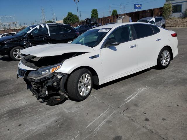 KIA OPTIMA LX 2018 with VIN 5XXGT4L32JG260614 - Photo from auction