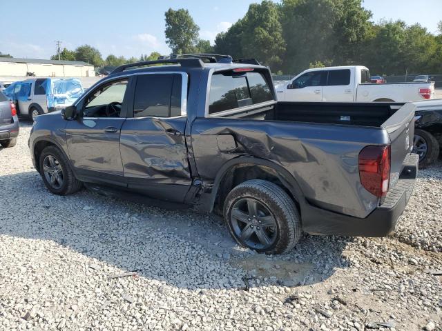 Photo 2 from auction – 2023 HONDA RIDGELINE with VIN 5FPYK3F52PB059121