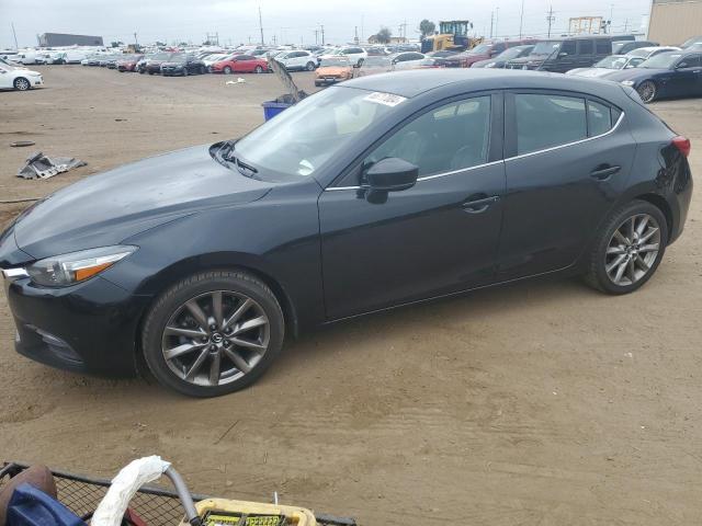 MAZDA 3 TOURING 2018 with VIN 3MZBN1L38JM181785 - Photo from auction
