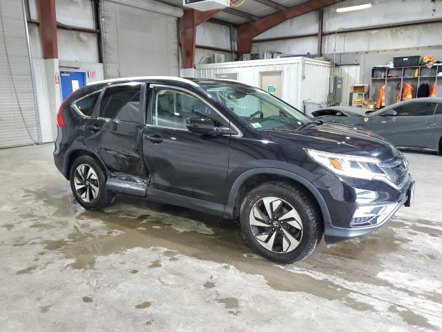 Photo 4 from auction – 2016 HONDA CR-V TOURI with VIN 5J6RM4H98GL046510
